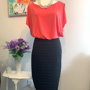 Dress with slit sleeves **Attractive**